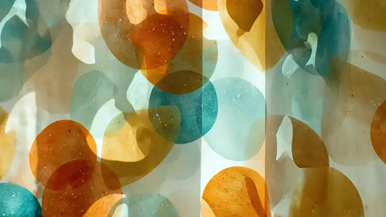 a pattern of see thorugh shapes cast on a screen